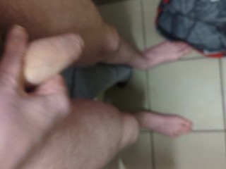 Stripping naked and masturbating in a public bathroom